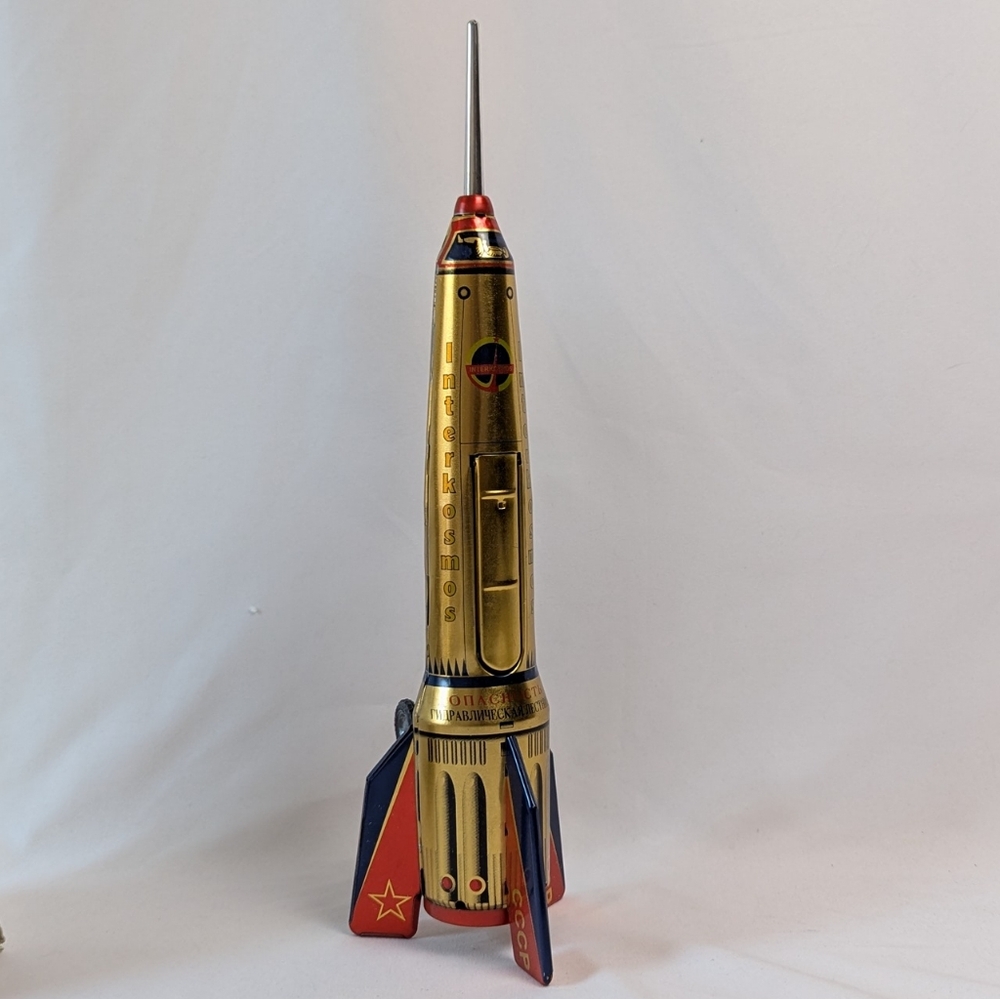 HOLDRAKETA Vintage Rocket Toy with Red and Gold Accents